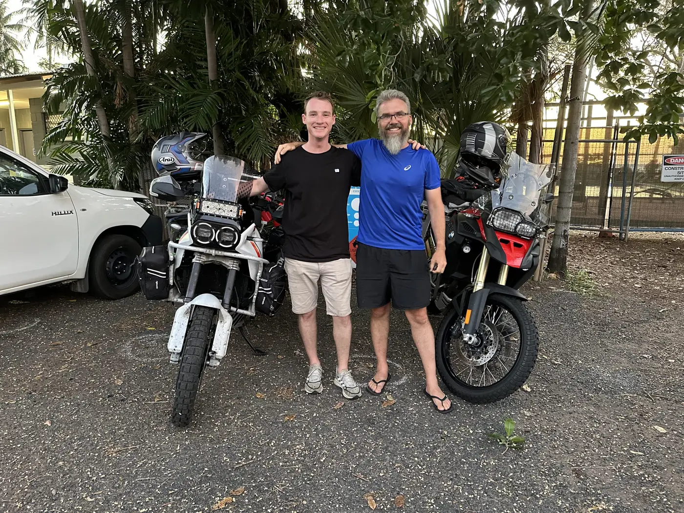 A companion with his Ducati, and the traveller and m’ Beemer — Australia.