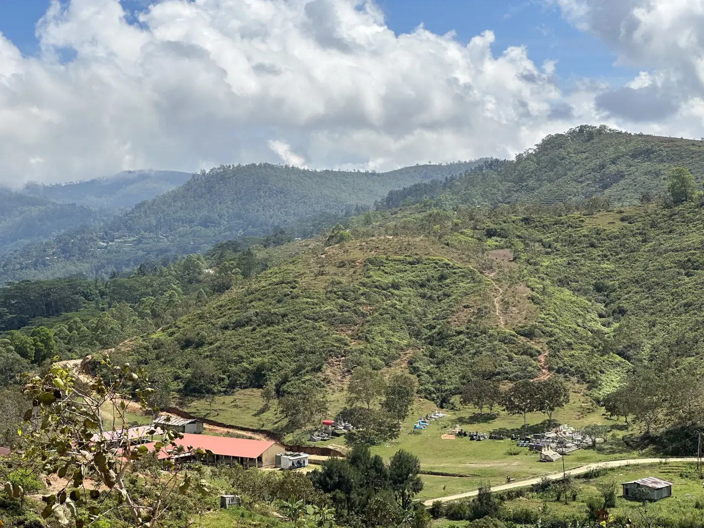 School down in the valley below — Timor-Leste.