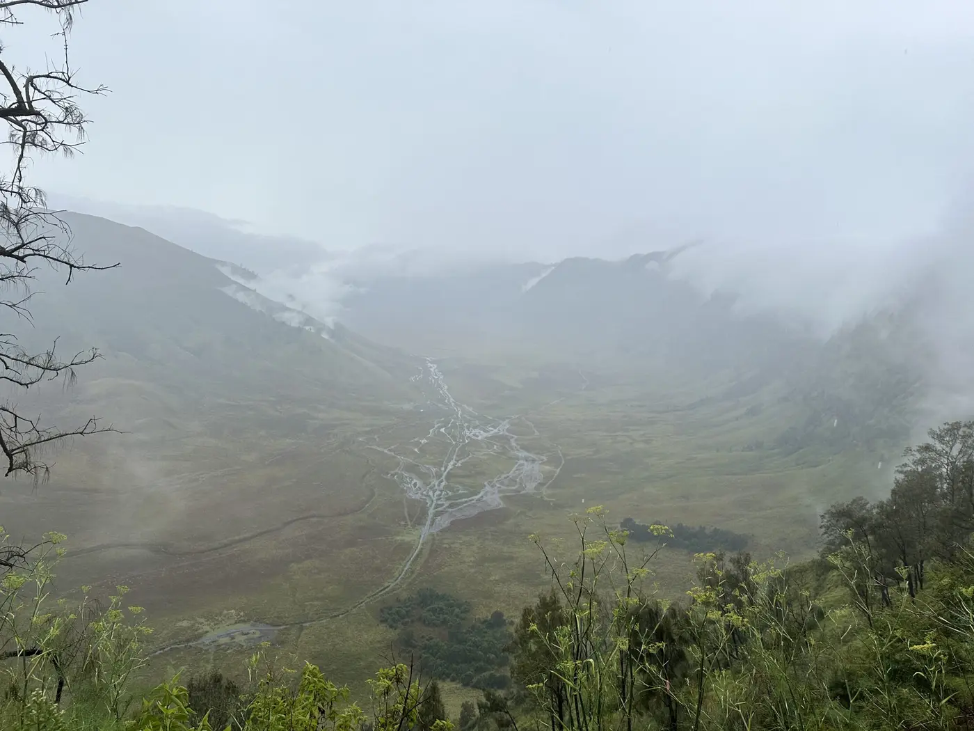 The vast, mist-filled Bromo volcanic caldera.